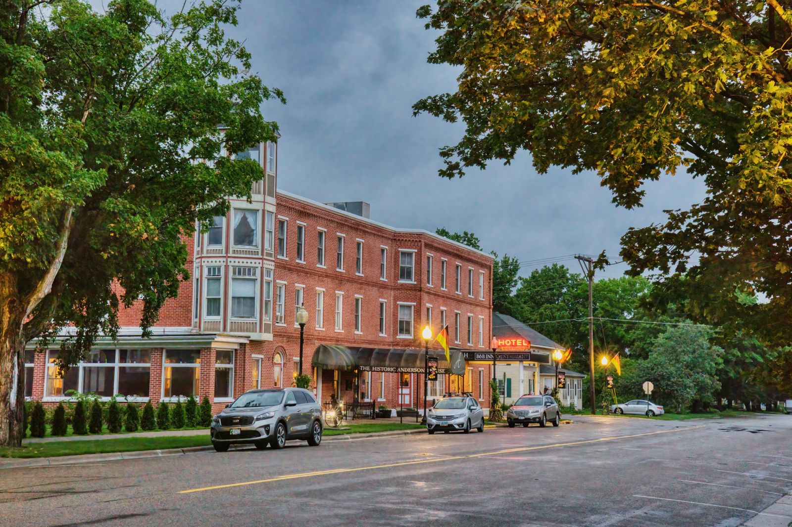 Scenic view of a historic Downtown building and street in Wabasha, MN with parked cars.